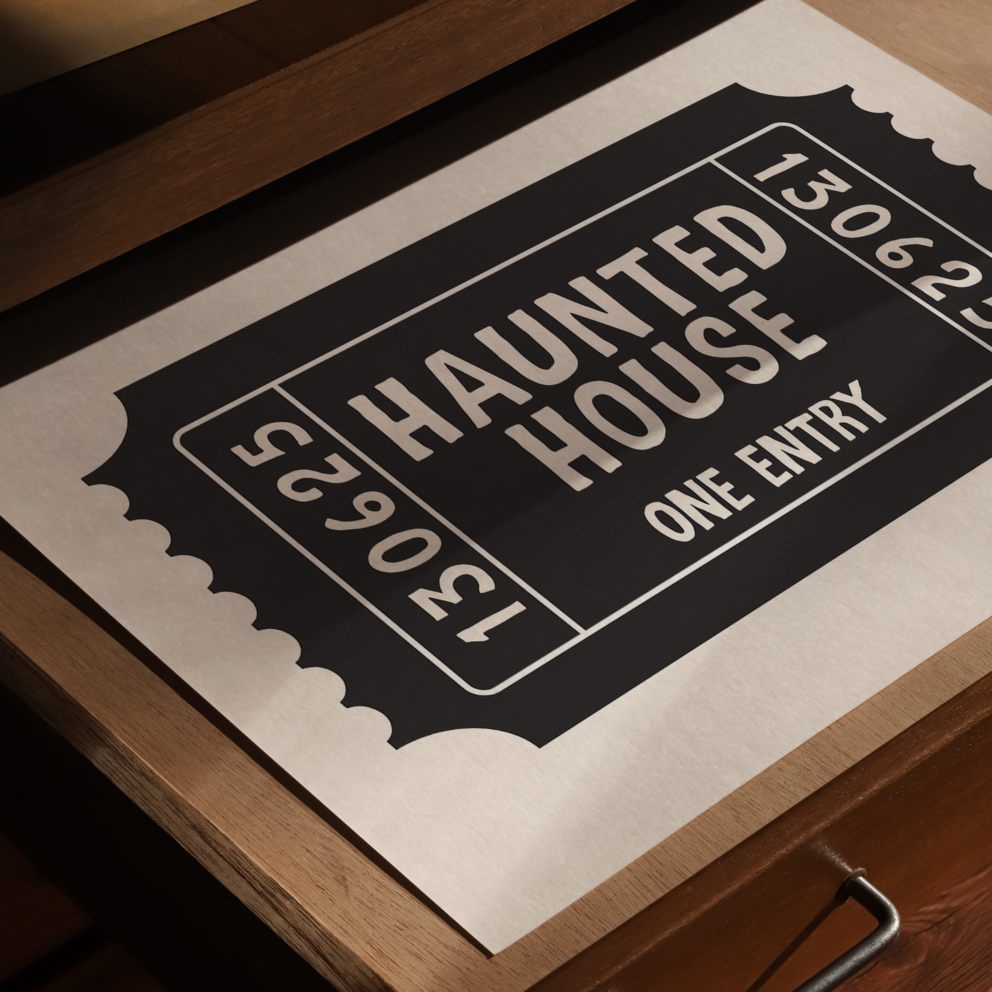 Wooden surface with a 'Haunted House' ticket design