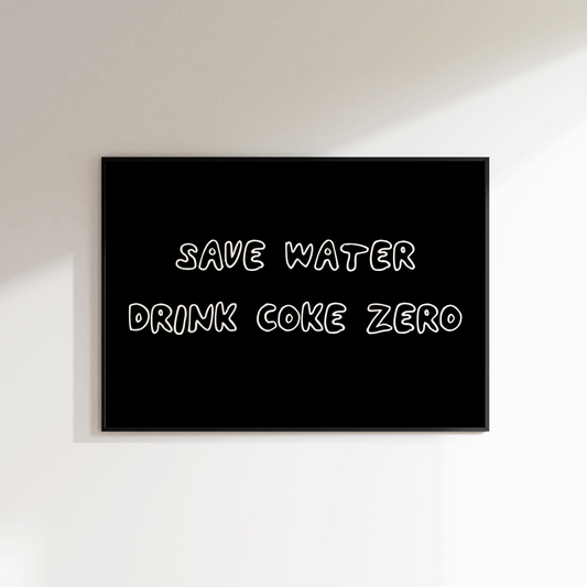 Black sign with white text 'SAVE WATER DRINK COKE ZERO' on a white wall.