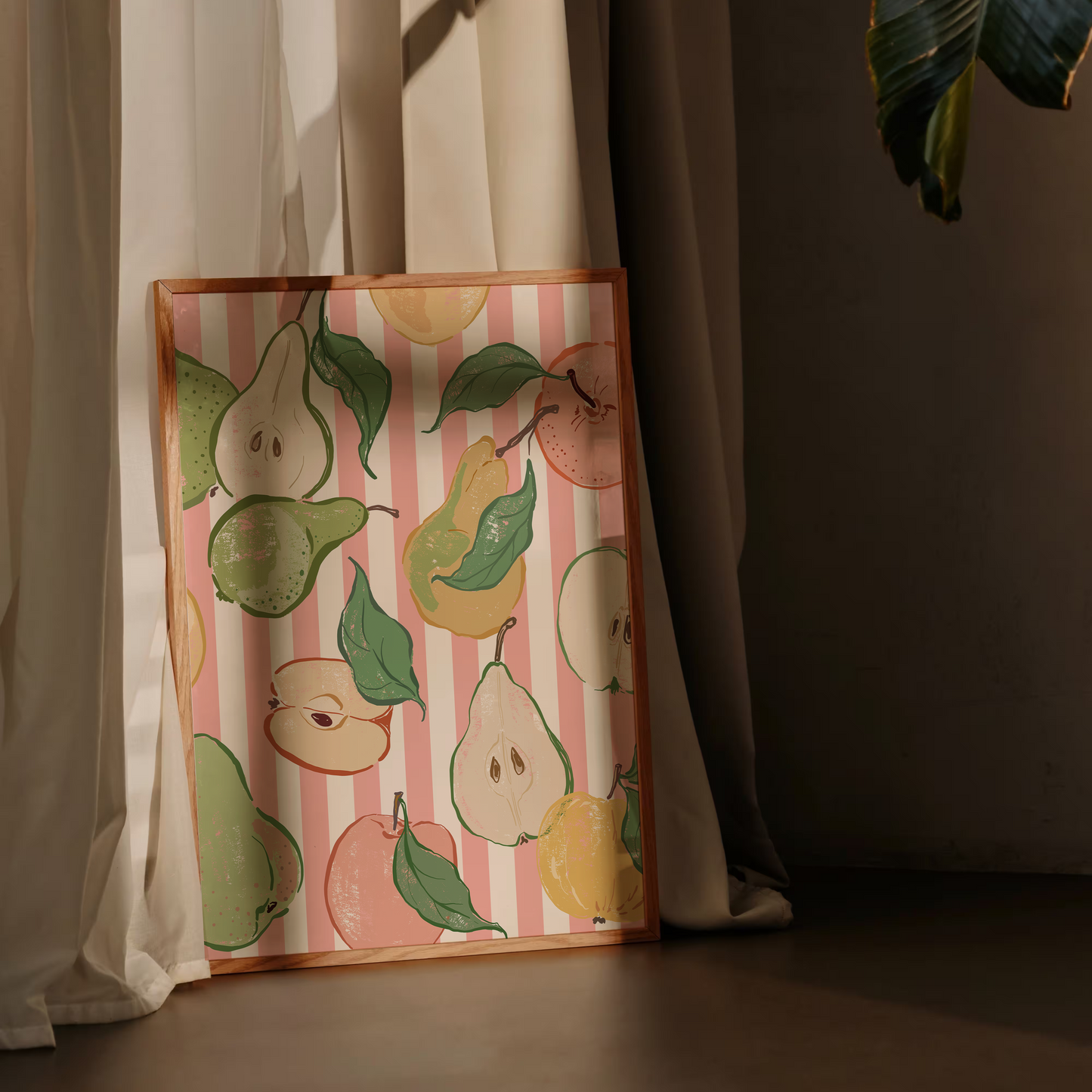 Decorative pillow with pear pattern on a striped background against a curtain.
