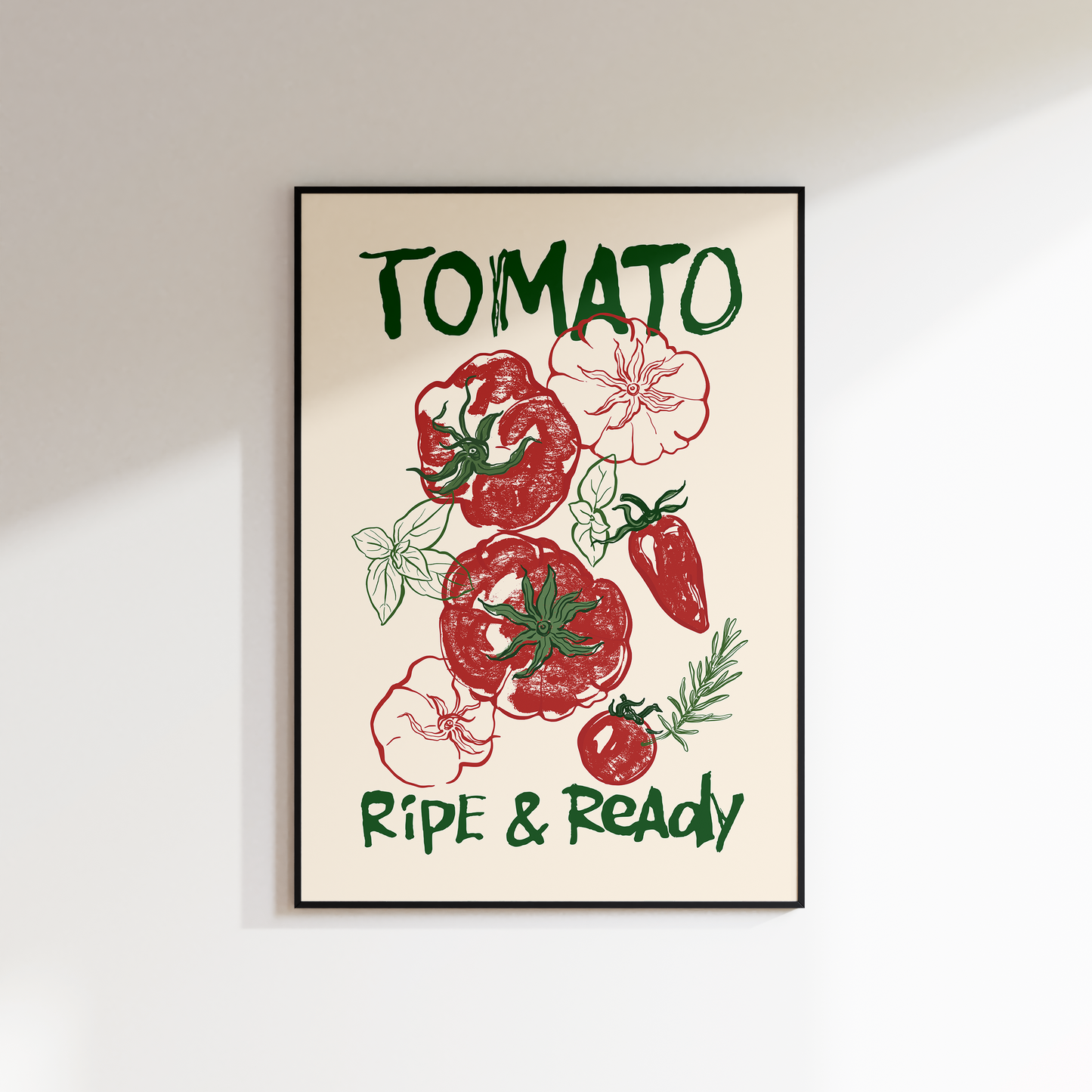 Framed artwork with illustrations of tomatoes and text on a white wall