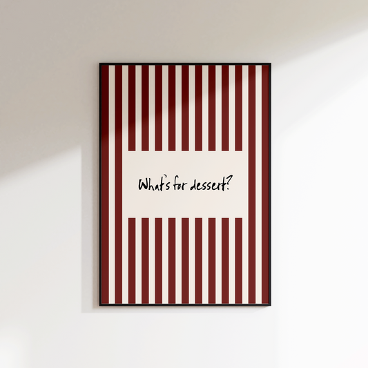 Framed artwork with red and white striped design and text on a white wall.