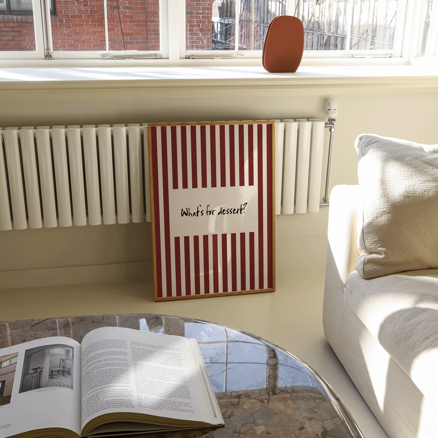 framed wall art that says "what's for dessert? leaning against the wall