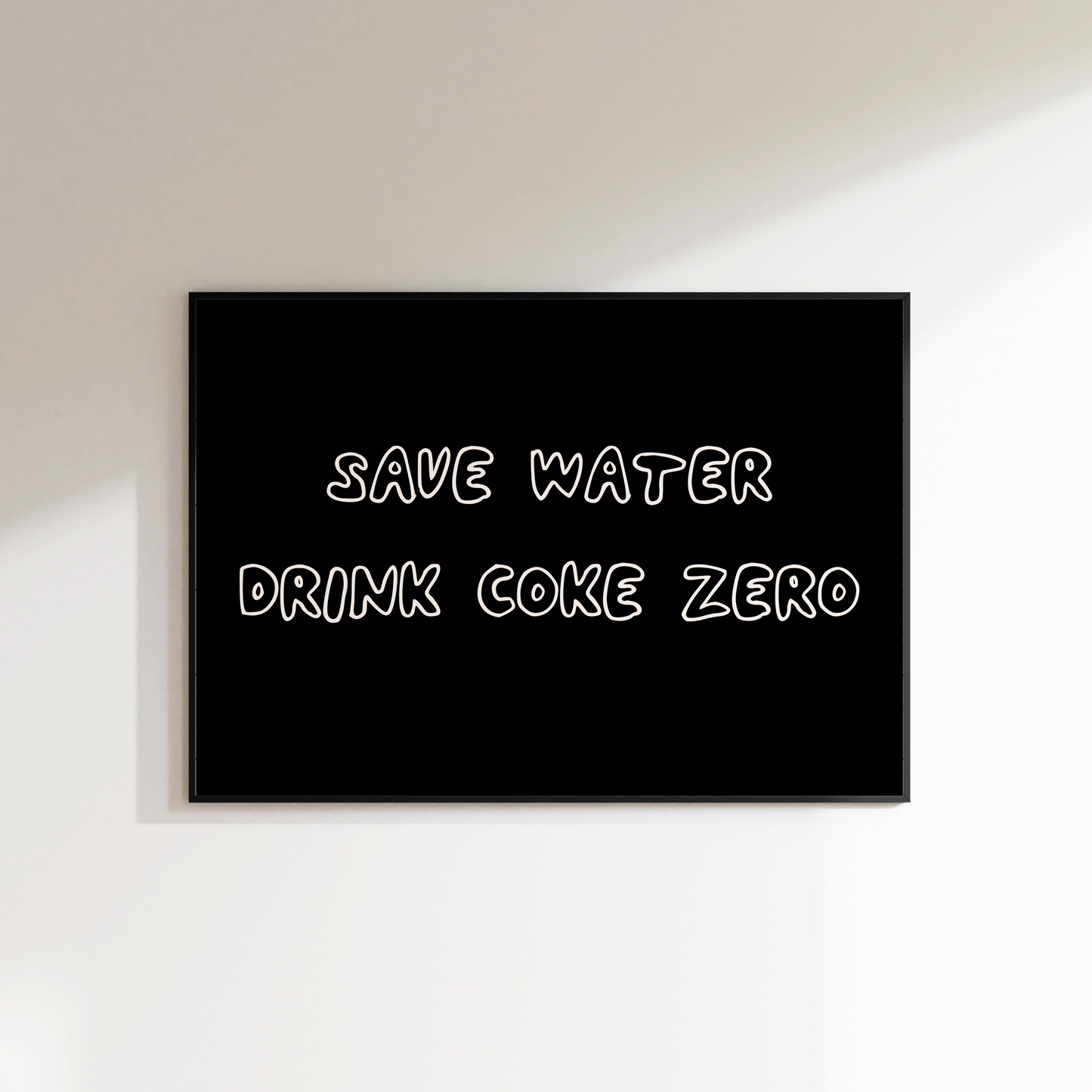 Black sign with white text 'SAVE WATER DRINK COKE ZERO' on a white wall.