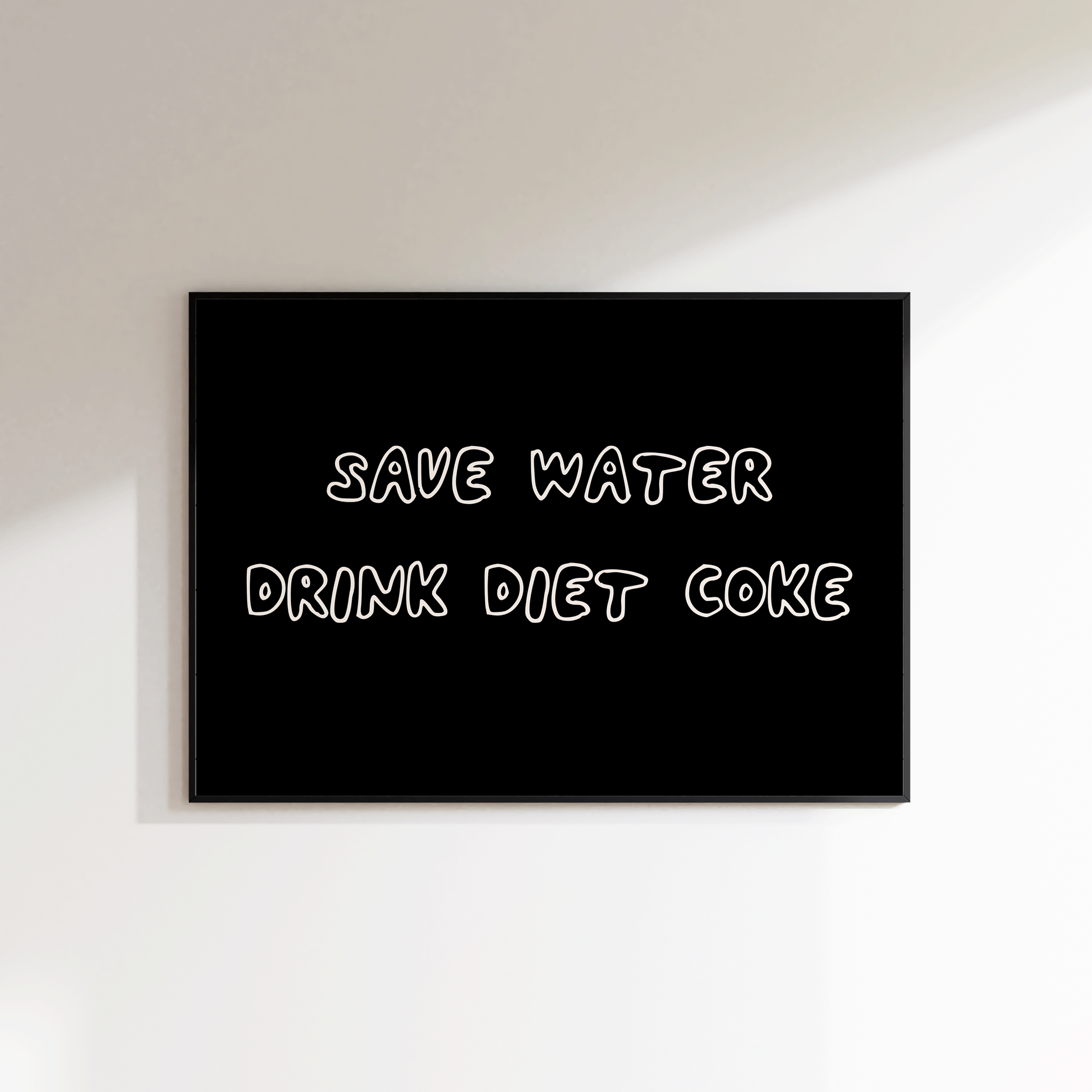 Black sign with white text 'SAVE WATER DRINK DIET COKE' on a white wall.