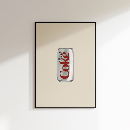 A framed wall art print featuring a stylized Diet Coke can centered on a warm cream background, hung on a white wall with soft diagonal shadows.