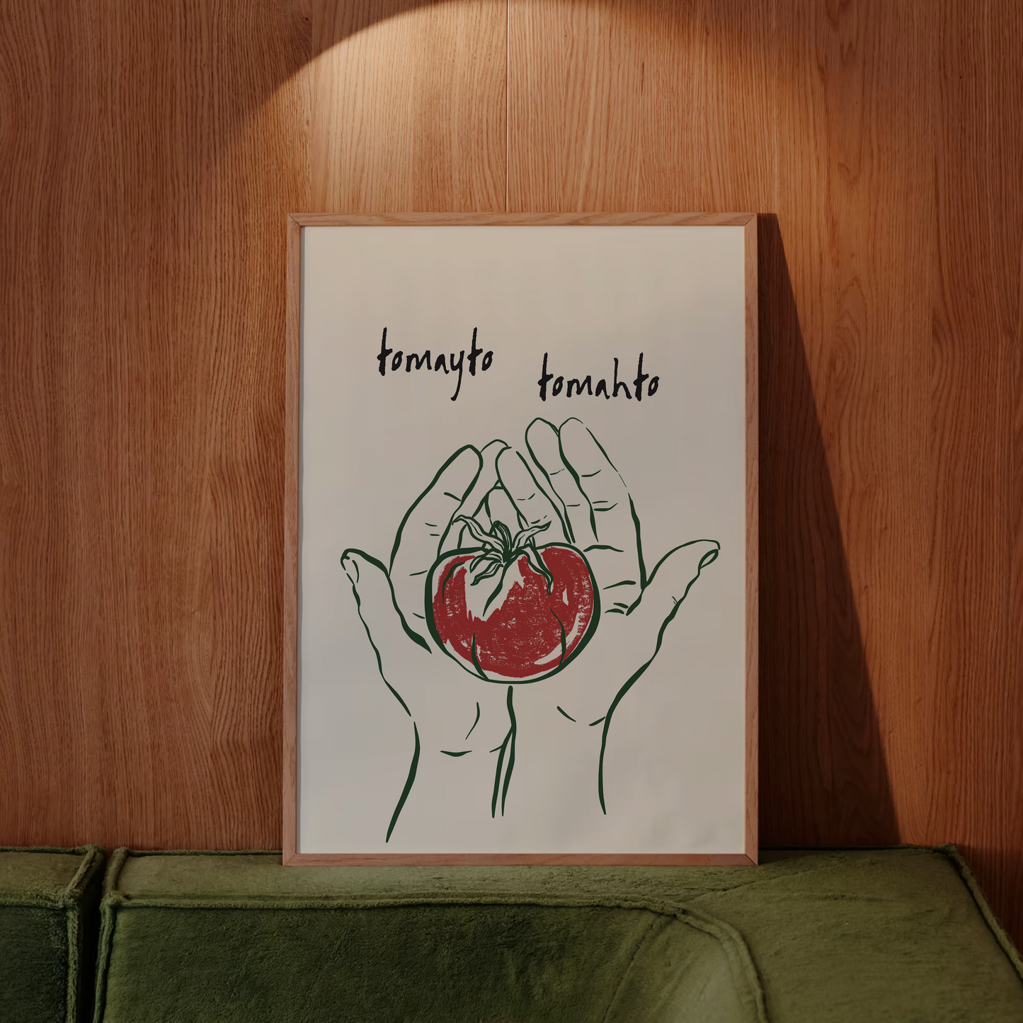 Framed artwork of hands holding a tomato against a wooden wall.