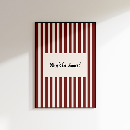 Framed artwork with red and white striped design and text on a white wall.